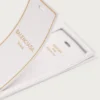Etichetă de bagaj cu parfumuri, în nuanța „Ivory White Dix”