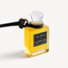 Talisman în formă de sticluță de parfum miniaturală, de culoare neagră