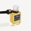 Talisman în formă de sticluță de parfum miniaturală, de culoare neagră