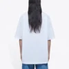 Tricou alb cu mâneci scurte, logo cu litere mici, croială lejeră 556104TYK289000